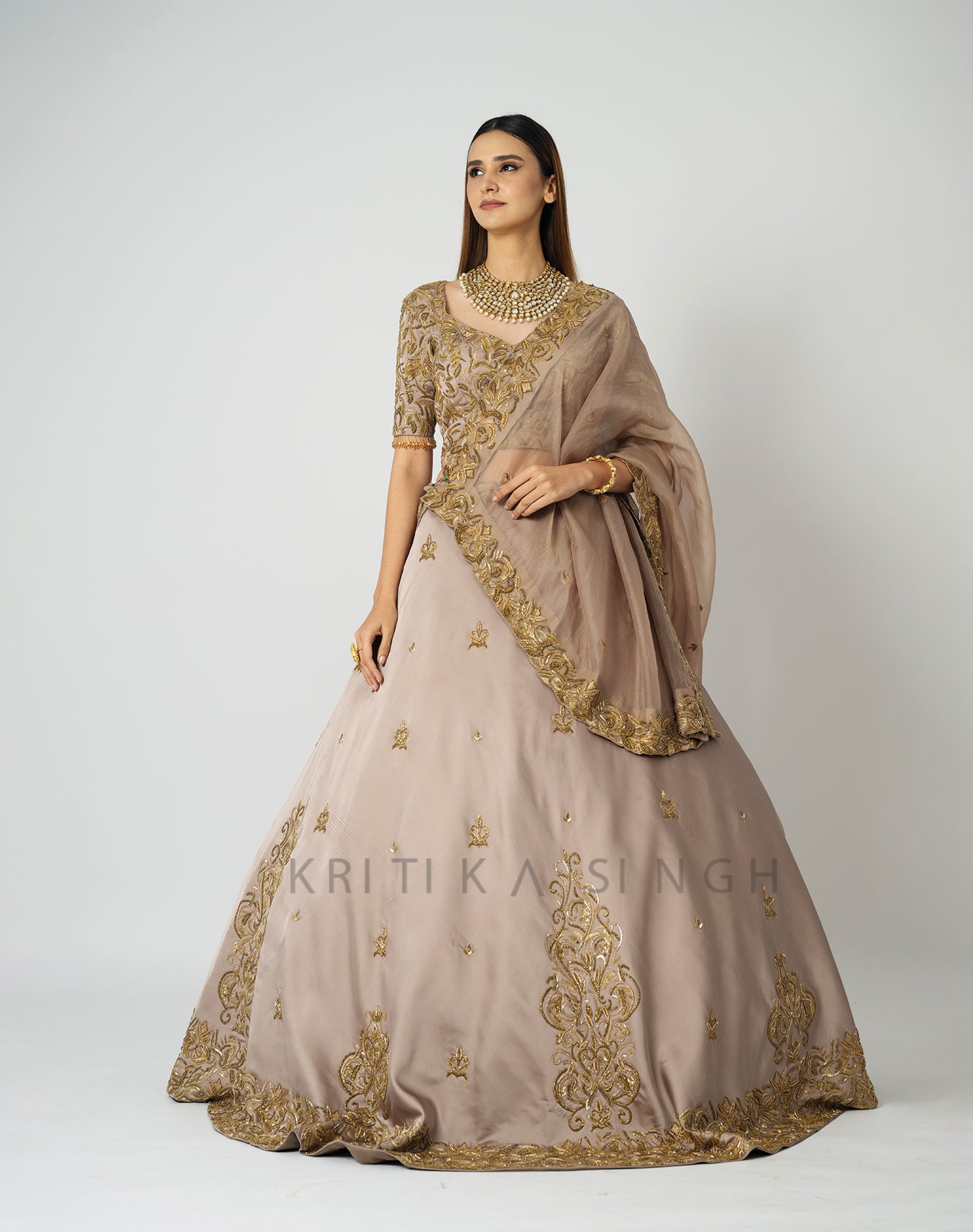 Shahana Metallic Champagne Gold Hand Embroidered  Bridal lehenga Set